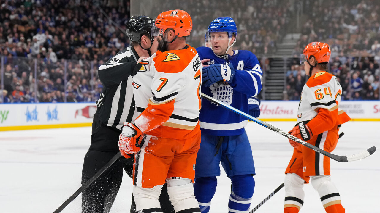 TORONTO, CANADA - MARCH 12: Morgan Rielly #44 of the Toronto Maple Leafs confronts Radko Gudas #7 of the Anaheim Ducks after kneeing Auston Matthews #34 (not shown) in the second period at Scotiabank Arena on March 12, 2026 in Toronto, Ontario, Canada.