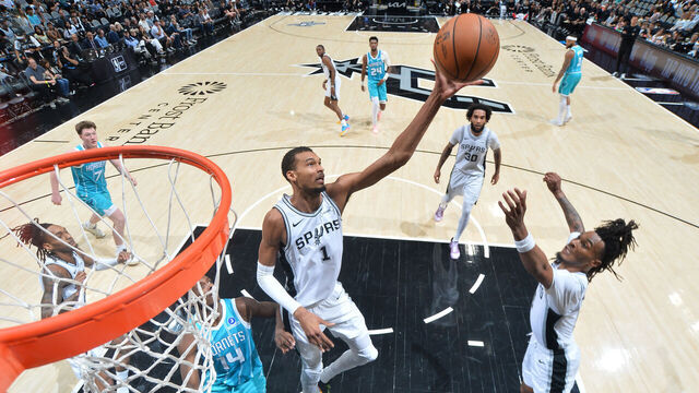 SAN ANTONIO, TX - MARCH 14: Victor Wembanyama #1 of the San Antonio Spurs goes up for the rebound during the game against the Charlotte Hornets on March 14, 2026 at the Frost Bank Center in San Antonio, Texas. Mandatory Copyright Notice: Copyright 2026 NBAE (Photos by Michael Gonzales/NBAE via Getty Images)