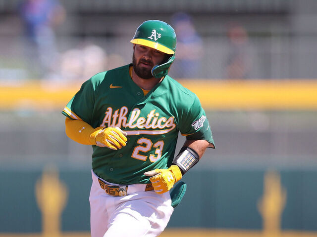 MESA, ARIZONA - MARCH 14: Shea Langeliers #23 of the Athletics rounds second base after hitting a home run during the first inning of the spring training game against the Kansas City Royals at Hohokam Stadium on March 14, 2026 in Mesa, Arizona.