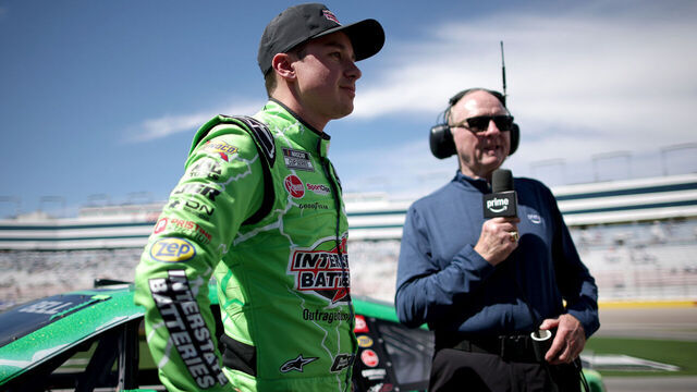 LAS VEGAS, NEVADA - MARCH 14: Christopher Bell, driver of the #20 Interstate Batteries Toyota, (L) speaks to NASCAR on Prime Video analyst, Larry McReynolds on the grid after winning the pole award during qualifying for the NASCAR Cup Series Pennzoil 400 presented by Jiffy Lube at Las Vegas Motor Speedway on March 14, 2026 in Las Vegas, Nevada.