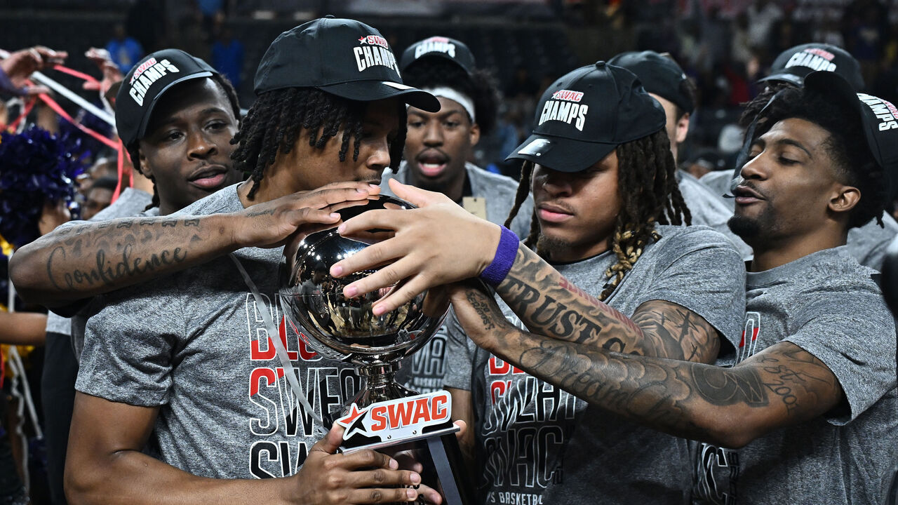 COLLEGE PARK, GEORGIA - MARCH 14: Members of the Prairie View A&M Panthers celebrate their team's 72-66 win over the Southern University Jaguars at the Southwestern Athletic Conference men's basketball tournament championship at Gateway Center Arena on March 14, 2026 in College Park, Georgia.