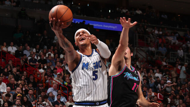 MIAMI, FL - MARCH 14: Paolo Banchero #5 of the Orlando Magic drives to the basket during the game against the Miami Heat on March 14, 2026 at Kaseya Center in Miami, Florida. Mandatory Copyright Notice: Copyright 2026 NBAE