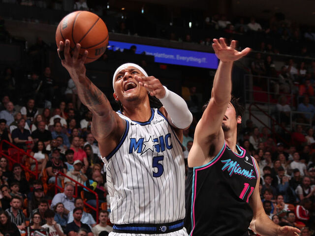 MIAMI, FL - MARCH 14: Paolo Banchero #5 of the Orlando Magic drives to the basket during the game against the Miami Heat on March 14, 2026 at Kaseya Center in Miami, Florida. Mandatory Copyright Notice: Copyright 2026 NBAE