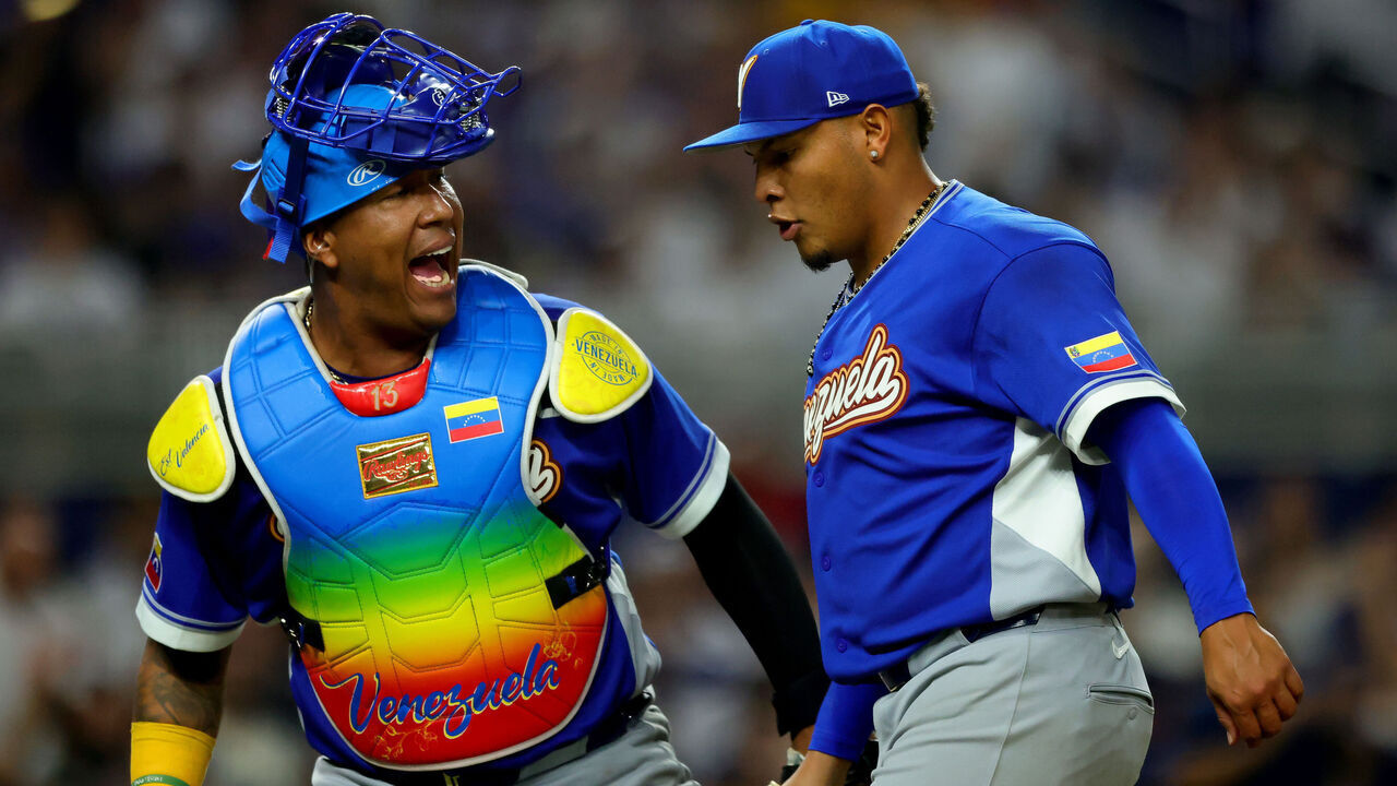 MIAMI, FL - MARCH 14: Salvador Perez #13 and Angel Zerpa #61 of team Venezuela reacts to a play during the 2026 World Baseball Classic Quarterfinals game presented by Capital One between Team Venezuela and Team Japan at loanDepot park on Saturday, March 14, 2026 in Miami, Florida.
