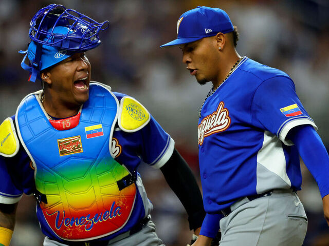 MIAMI, FL - MARCH 14: Salvador Perez #13 and Angel Zerpa #61 of team Venezuela reacts to a play during the 2026 World Baseball Classic Quarterfinals game presented by Capital One between Team Venezuela and Team Japan at loanDepot park on Saturday, March 14, 2026 in Miami, Florida.