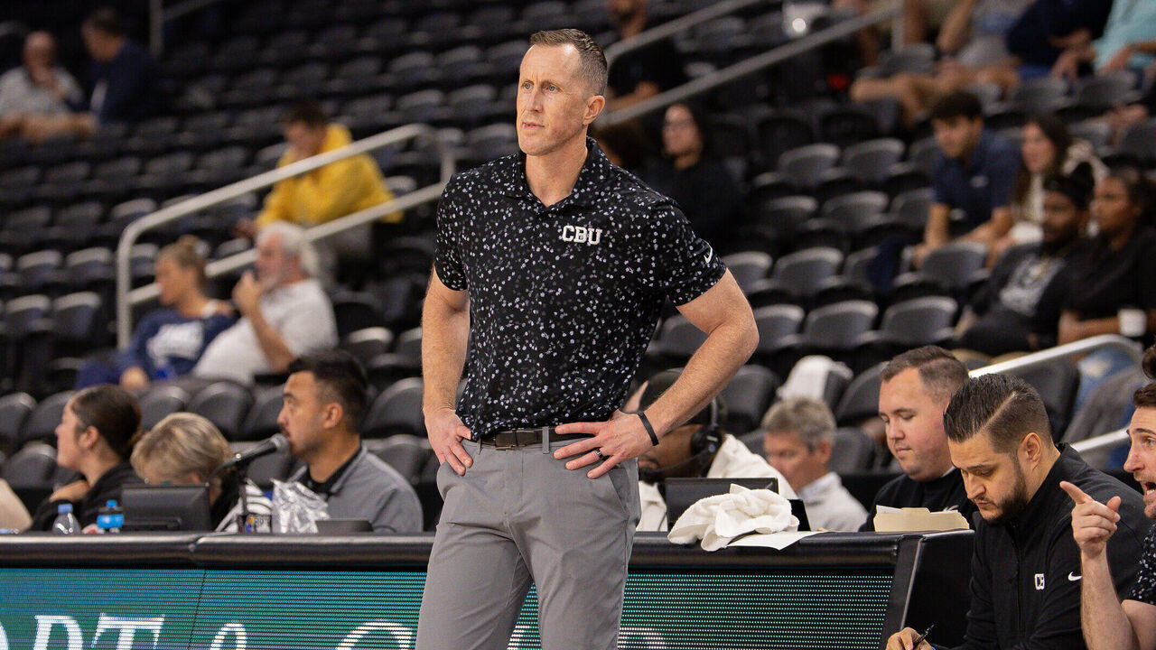 PALM DESERT, CA - NOVEMBER 25: California Baptist Lancers head coach Rick Croy watches from the sidelines during the Acrisure Series men's college basketball tournament game between the California Baptist Lancers and the San Diego Toreros on November 25, 2025, at the Acrisure Arena in Palm Valley, CA.