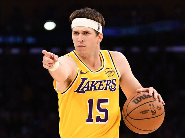 LOS ANGELES, CA - MARCH 14: Austin Reaves #15 of the Los Angeles Lakers dribbles the ball during the game against the Denver Nuggets on March 14, 2026 at Crypto.Com Arena in Los Angeles, California. NOTE TO USER: User expressly acknowledges and agrees that, by downloading and/or using this Photograph, user is consenting to the terms and conditions of the Getty Images License Agreement. Mandatory Copyright Notice: Copyright 2026 NBAE