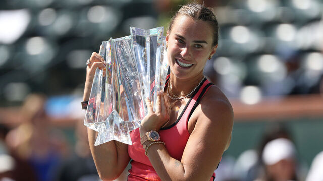 INDIAN WELLS, CALIFORNIA - MARCH 15: Aryna Sabalenka poses with the championship trophy after defeating Elena Rybakina of Kazakhstan during their Women's Singles Finals match on Day 12 of the BNP Paribas Open at Indian Wells Tennis Garden on March 15, 2026 in Indian Wells, California.