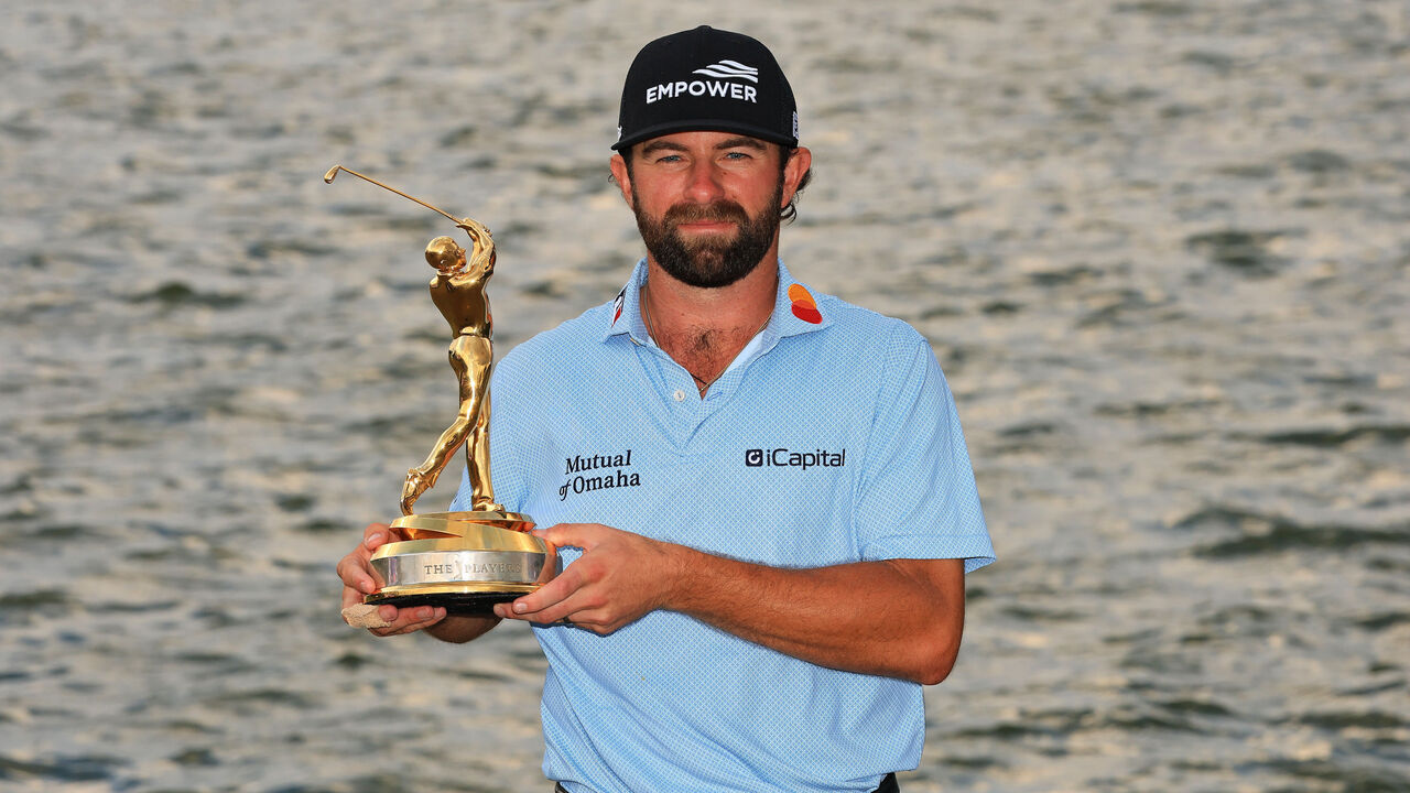 PONTE VEDRA BEACH, FLORIDA - MARCH 15: Cameron Young of the United States holds the trophy following his victory during the final round of THE PLAYERS Championship 2026 at THE PLAYERS Stadium course at TPC Sawgrass on March 15, 2026 in Ponte Vedra Beach, Florida.