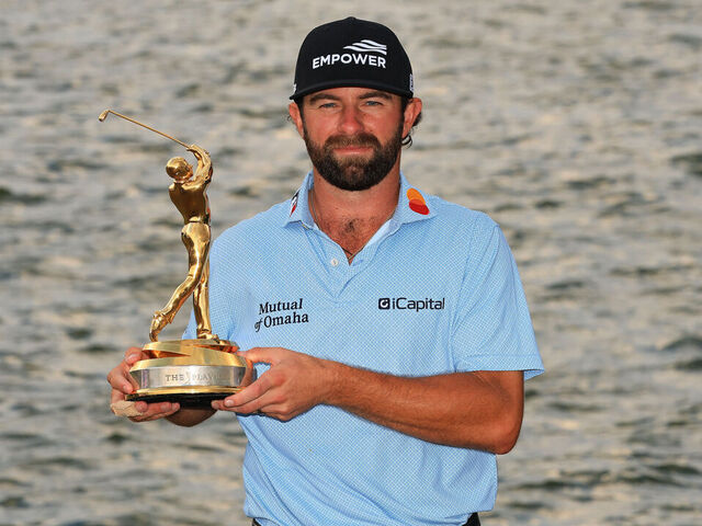 PONTE VEDRA BEACH, FLORIDA - MARCH 15: Cameron Young of the United States holds the trophy following his victory during the final round of THE PLAYERS Championship 2026 at THE PLAYERS Stadium course at TPC Sawgrass on March 15, 2026 in Ponte Vedra Beach, Florida.