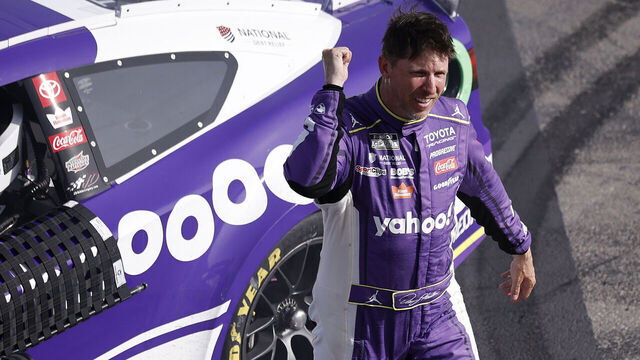 LAS VEGAS, NEVADA - MARCH 15: Denny Hamlin, driver of the #11 Yahoo! Toyota, celebrates after winning the NASCAR Cup Series Pennzoil 400 presented by Jiffy Lube at Las Vegas Motor Speedway on March 15, 2026 in Las Vegas, Nevada.