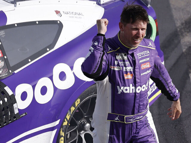 LAS VEGAS, NEVADA - MARCH 15: Denny Hamlin, driver of the #11 Yahoo! Toyota, celebrates after winning the NASCAR Cup Series Pennzoil 400 presented by Jiffy Lube at Las Vegas Motor Speedway on March 15, 2026 in Las Vegas, Nevada.