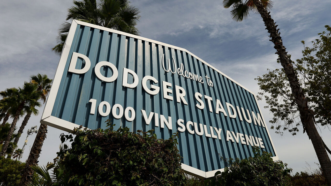 LOS ANGELES, CALIFORNIA - SEPTEMBER 17: A "Welcome to Dodger Stadium" sign is displayed before the game between the Philadelphia Phillies and the Los Angeles Dodgers at Dodger Stadium on September 17, 2025 in Los Angeles, California.