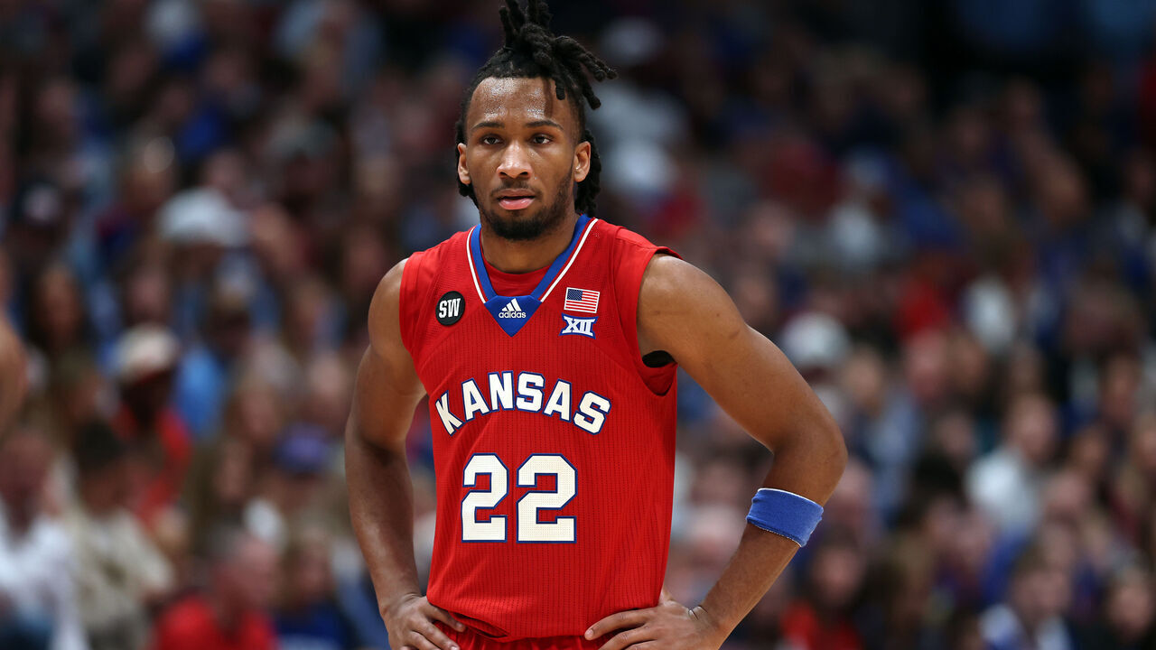LAWRENCE, KANSAS - MARCH 07: Darryn Peterson #22 of the Kansas Jayhawks watches during a timeout in the game against the Kansas State Wildcats at Allen Fieldhouse on March 07, 2026 in Lawrence, Kansas.