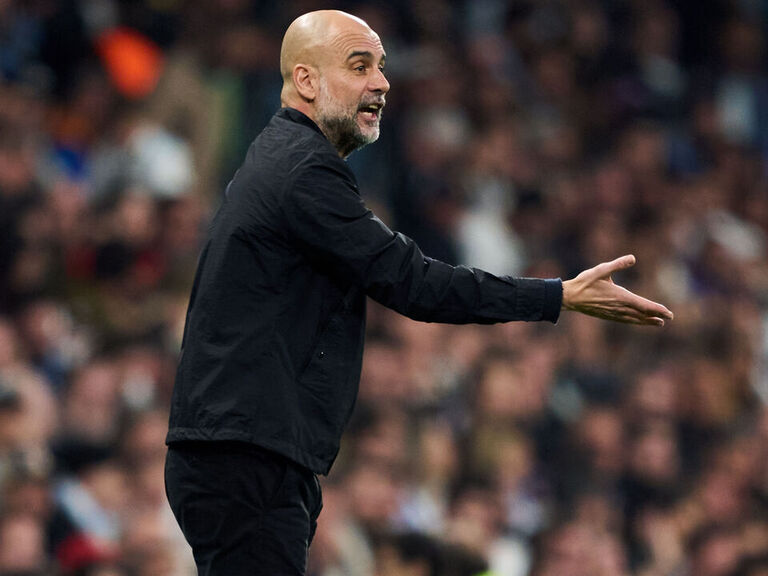 Pep Guardiola on the sidelines during Champions League match