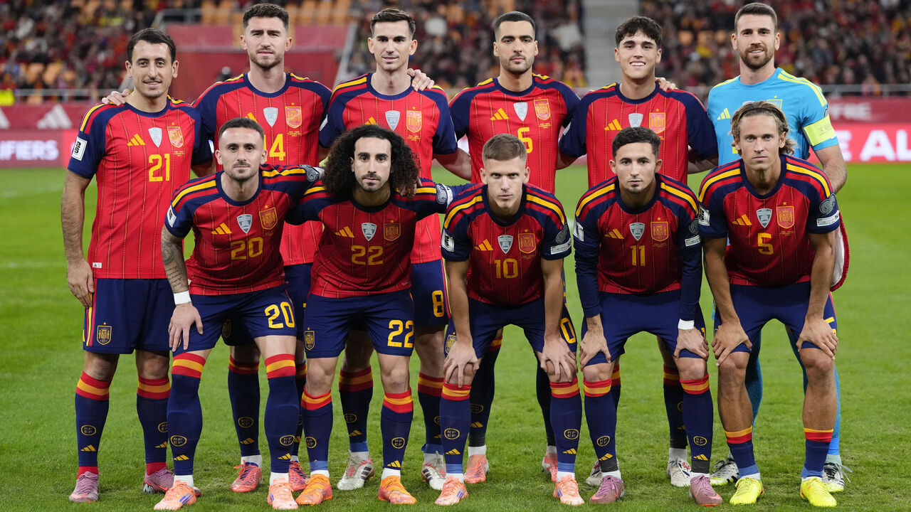 Spain line up (L-R) Mikel Oyarzabal, Aymeric Laporte, Fabian Ruiz, Mikel Merino, Pau Cubarsi, Unai Simon, Aleix Garcia, Marc Cucurella, Dani Olmo, Yeremy Pino, Marcos Llorente during the FIFA World Cup 2026 qualifier match between Spain and Türkiye at Estadio de La Cartuja on November 18, 2025 in Seville, Spain.
