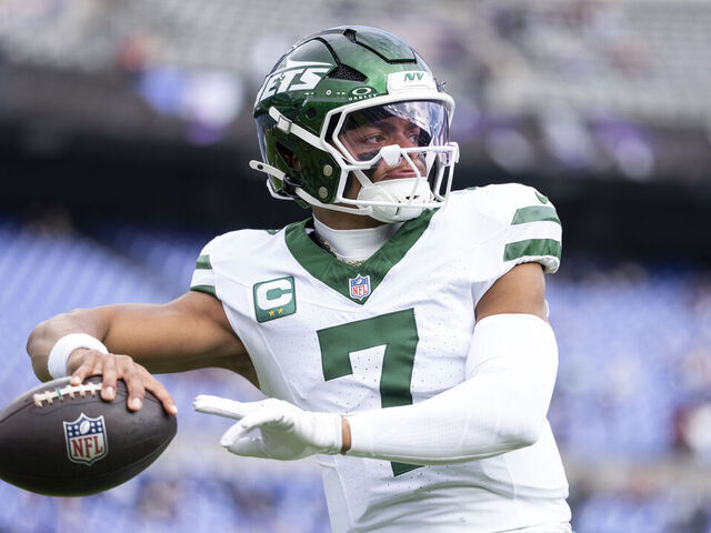 BALTIMORE, MARYLAND - NOVEMBER 23: Justin Fields #7 of the New York Jets looks to pass prior to an NFL football game against the Baltimore Ravens at M&T Bank Stadium on November 23, 2025 in Baltimore, Maryland.