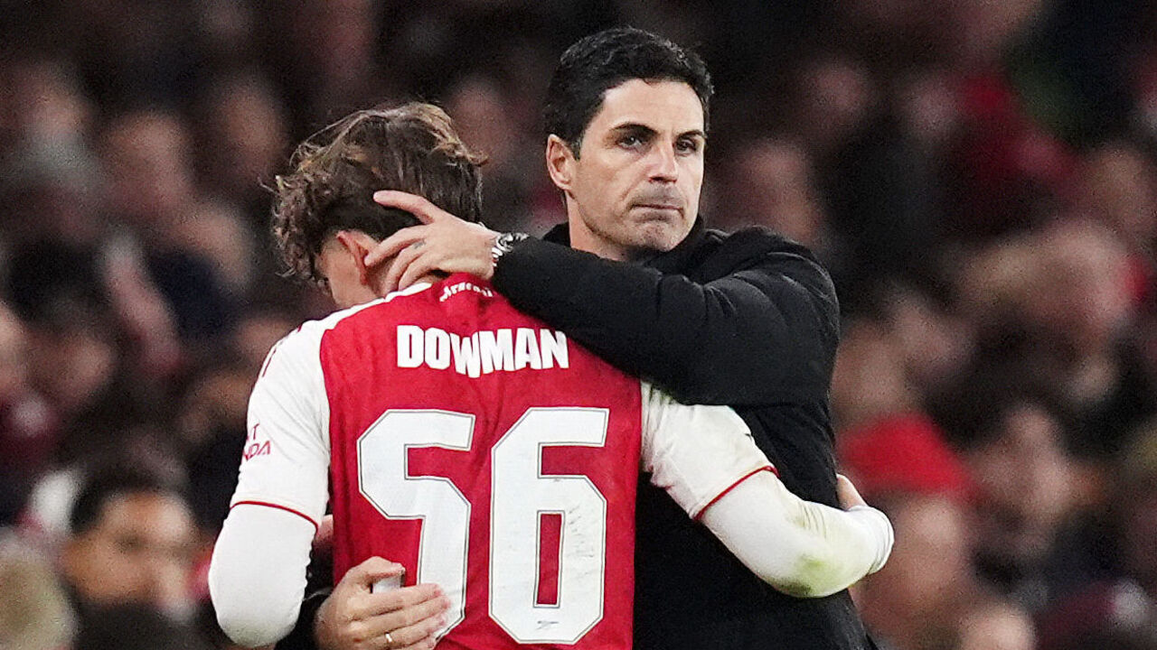 Arsenal manager Mikel Arteta (right) embraces Max Dowman as he leaves the field after being substituted during the Carabao Cup fourth round match at Emirates Stadium, London. Picture date: Wednesday October 29, 2025.