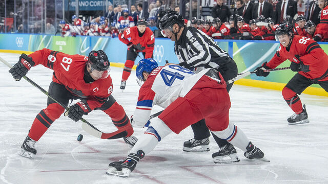 Sidney Crosby,Tomas Hertl during the Men's Playoffs Quarterfinal match between Canada and Chechia on day twelve of the Milano Cortina 2026 Winter Olympic games at Milano Santagiulia Ice Hockey Arena on February 18, 2026 in Milan, Italy.