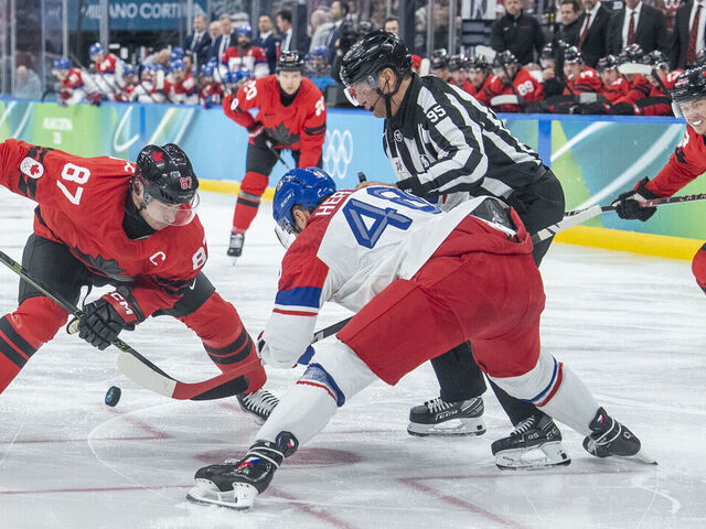 Sidney Crosby,Tomas Hertl during the Men's Playoffs Quarterfinal match between Canada and Chechia on day twelve of the Milano Cortina 2026 Winter Olympic games at Milano Santagiulia Ice Hockey Arena on February 18, 2026 in Milan, Italy.