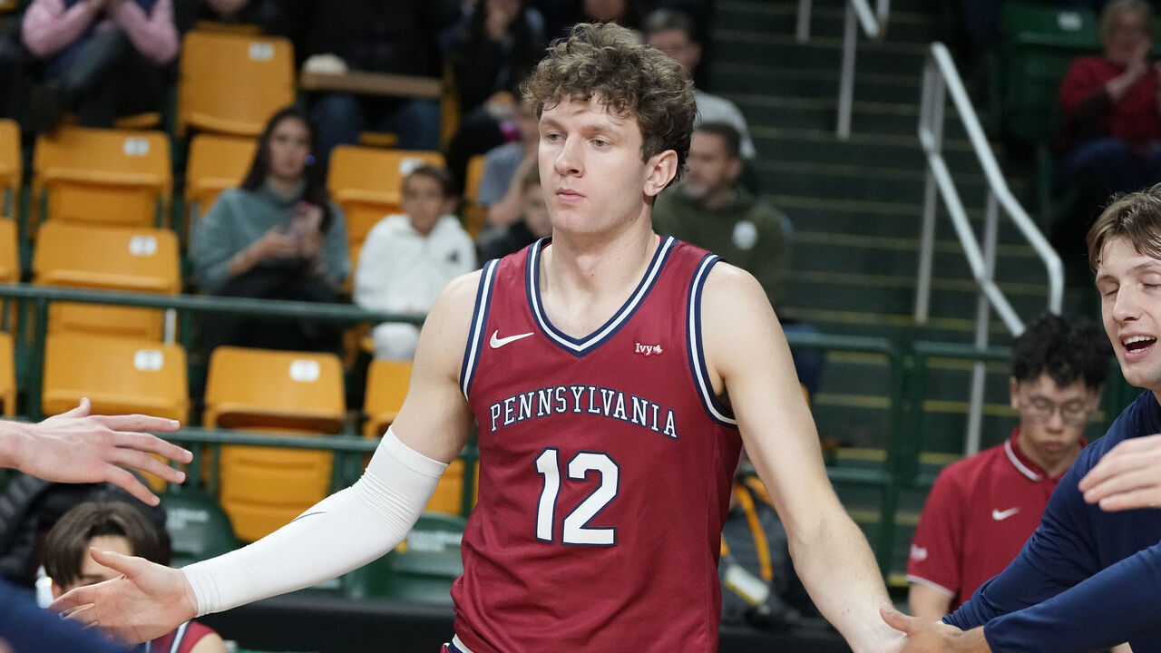 FAIRFAX, VIRGINIA - DECEMBER 28: TJ Power #12 of the Penn Quakers introduced before a college basketball game against the George Mason Patriots at the EagleBank Arena on December 28, 2025 in Fairfax, Virginia.