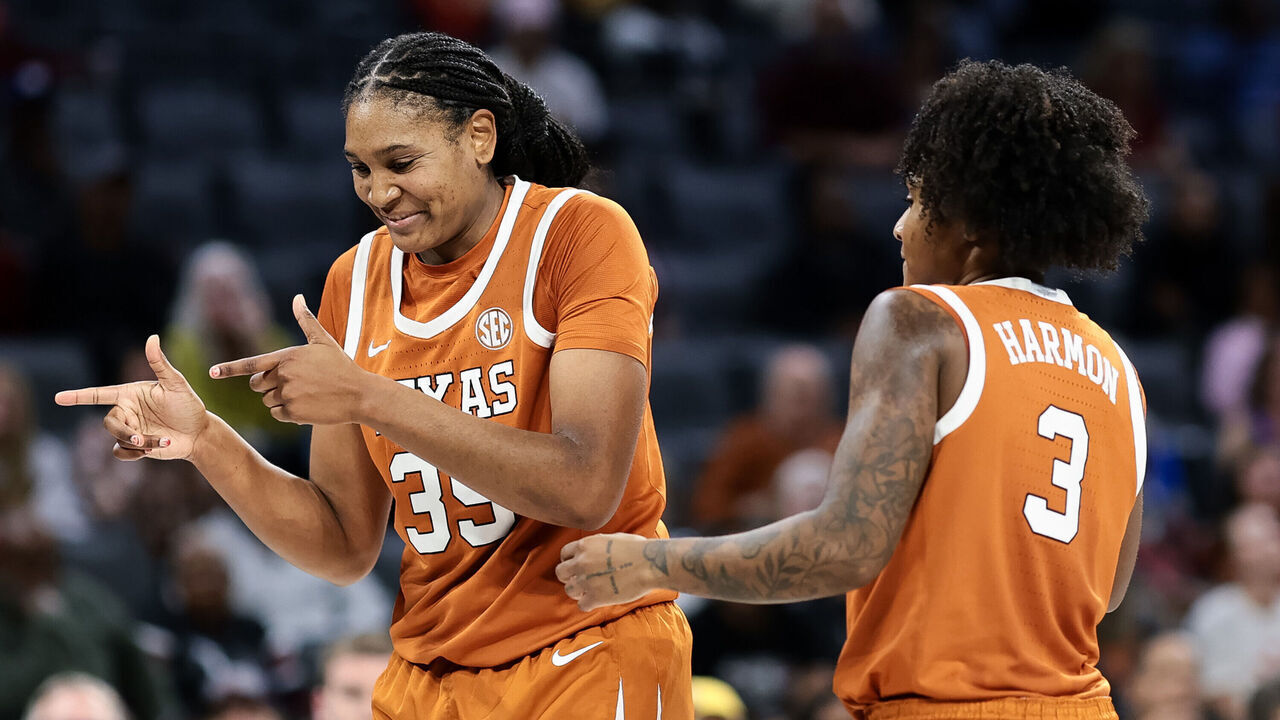 LAS VEGAS, NEVADA - NOVEMBER 27: Madison Booker #35 of the Texas Longhorns reacts alongside Rori Harmon #3 of the Texas Longhorns against the South Carolina Gamecocks during the second half during the Players Era Championship basketball tournament at Michelob ULTRA Arena on November 27, 2025 in Las Vegas, Nevada.