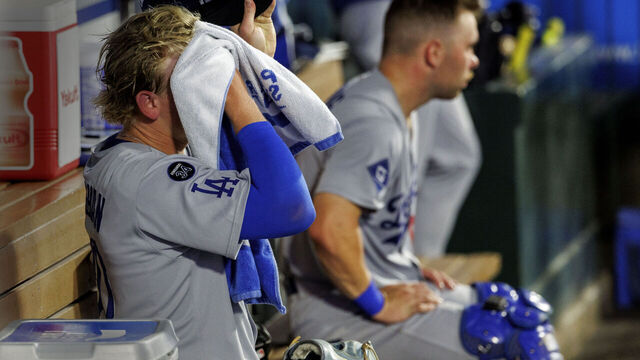 ANAHEIM, CA -AUGUST 12, 2025: Los Angeles Dodgers pitcher Emmet Sheehan (80) towels off the sweat in the dugout against the Angels in the fifth inning at Angel Stadium on August 12, 2025 in Anaheim, California.(Gina Ferazzi / Los Angeles Times via Getty Images)