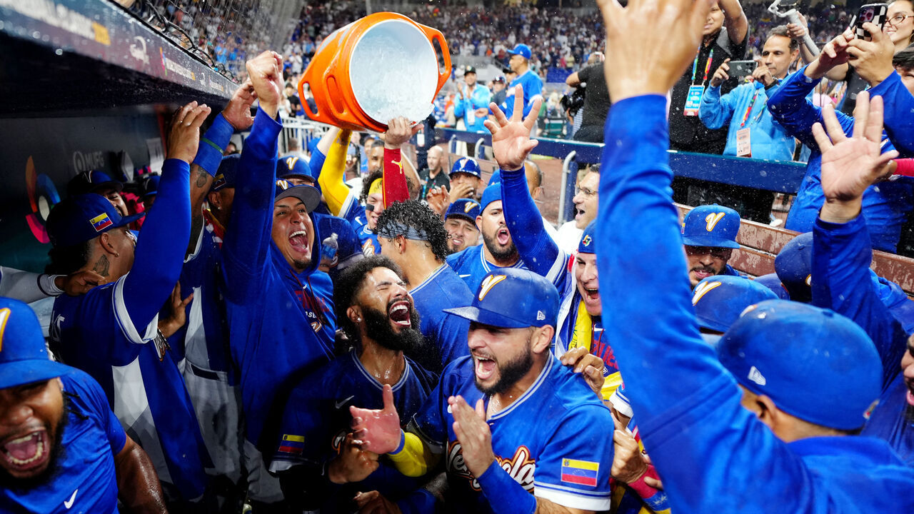 MIAMI, FL - MARCH 16: Gleyber Torres #25 of Team Venezuela celebrates with teammates after Team Venezuela defeated Team Italy in the 2026 World Baseball Classic WBC game presented by Capital One at loanDepot park on Monday, March 16, 2026 in Miami, Florida.