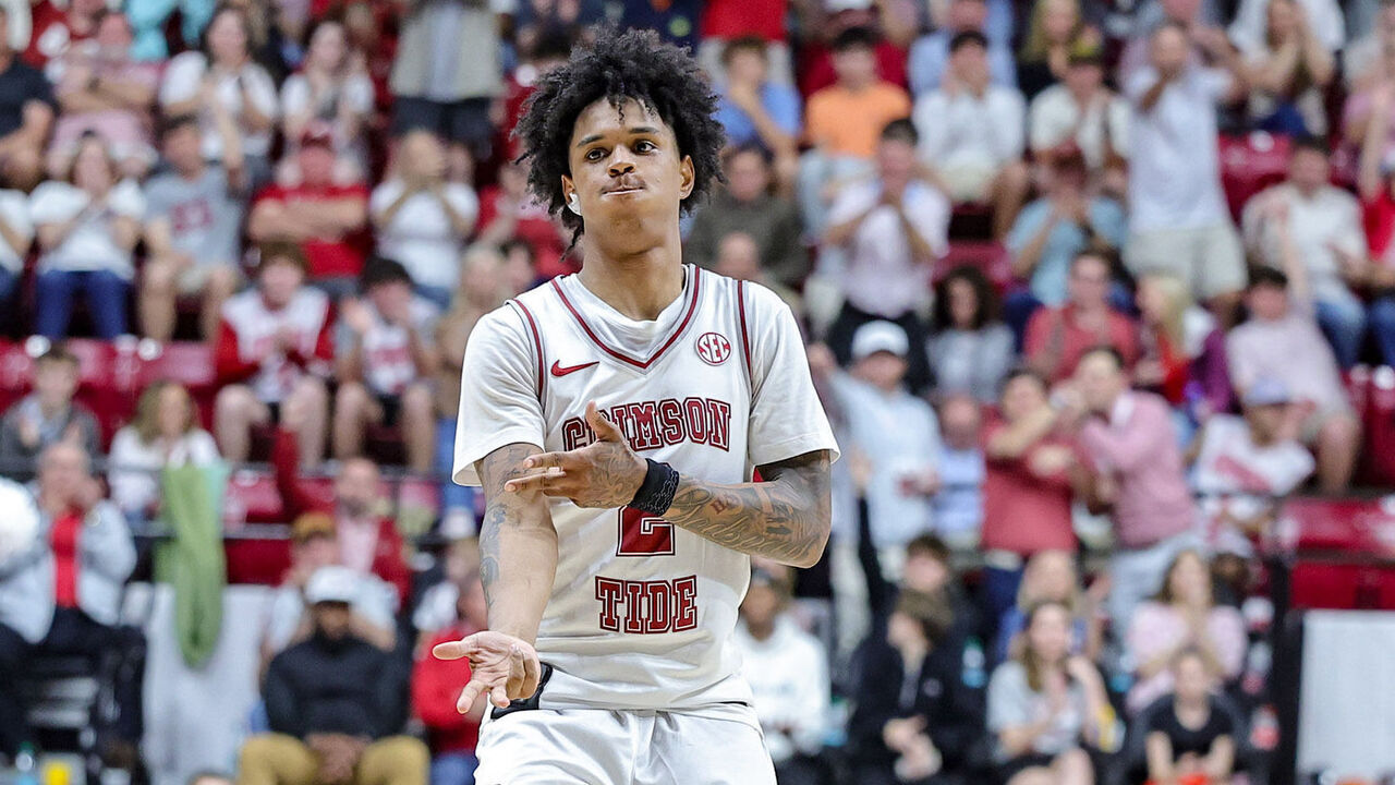 TUSCALOOSA, ALABAMA - MARCH 7: Aden Holloway #2 of the Alabama Crimson Tide reacts after knocking down a second half three against the Auburn Tigers] at Coleman Coliseum on March 7, 2026 in Tuscaloosa, Alabama.