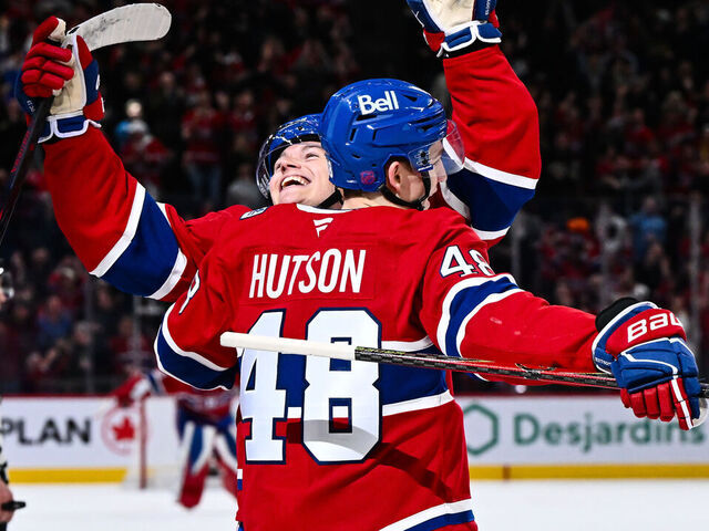 MONTREAL, CANADA - MARCH 17: Cole Caufield #13 of the Montréal Canadiens celebrates his 40th goal of the season with teammate Lane Hutson #48 after scoring in overtime against the Boston Bruins at the Bell Centre on March 17, 2026 in Montreal, Quebec, Canada. The Montréal Canadiens defeated the Boston Bruins 3-2 in overtime.