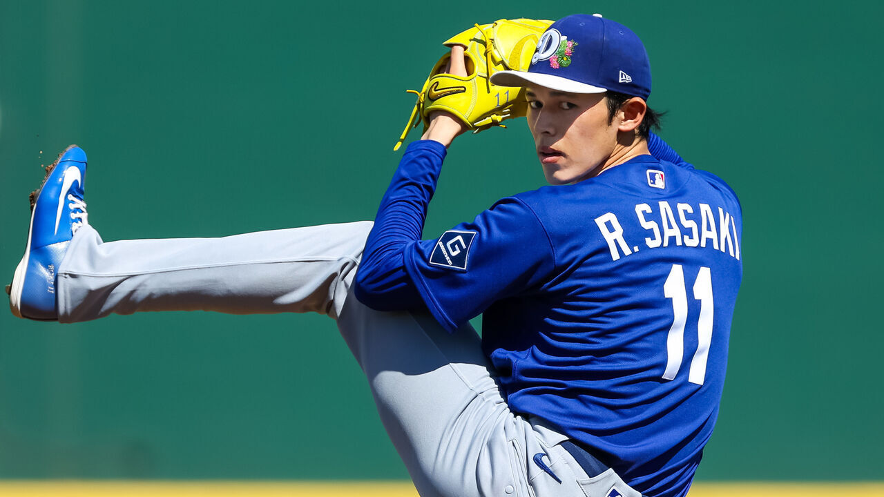 GOODYEAR, ARIZONA - MARCH 3: Roki Sasaki #11 of the Los Angeles Dodgers warms up during the first inning of the spring training game against the Cleveland Guardians at Goodyear Ballpark on March 3, 2026 in Goodyear, Arizona.