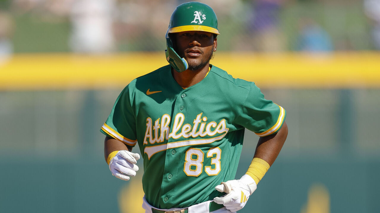 MESA, ARIZONA - MARCH 8: Leo de Vries #83 of the Athletics rounds the bases after hitting a grand slam home run during a Spring Training game against the Los Angeles Dodgers at HoHoKam Stadium on March 8, 2026 in Mesa, Arizona.