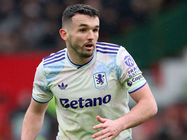 MANCHESTER, ENGLAND - MARCH 15: John McGinn of Aston Villa running during the Premier League match between Manchester United and Aston Villa at Old Trafford on March 15, 2026 in Manchester, England.