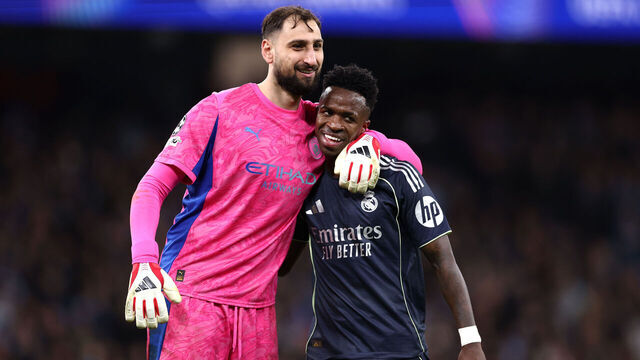 MANCHESTER, ENGLAND - MARCH 17: Gianluigi Donnarumma of Manchester City interacts with Vinicius Junior of Real Madrid during the UEFA Champions League 2025/26 Round of 16 Second Leg match between Manchester City FC and Real Madrid CF at City of Manchester Stadium on March 17, 2026 in Manchester, England.