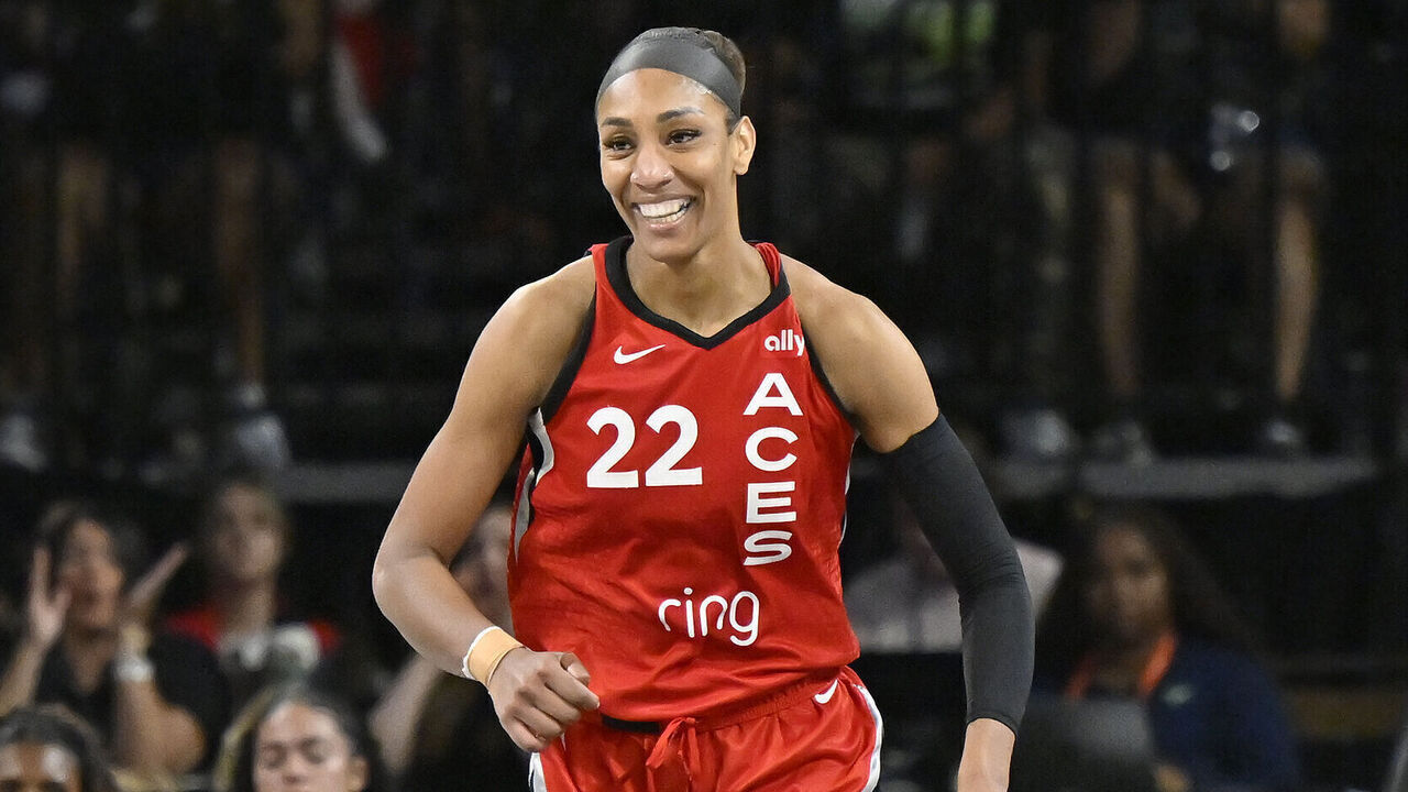 LAS VEGAS, NV - AUGUST 17: A'ja Wilson #22 of the Las Vegas Aces smiles during the game against the Dallas Wings on August 17, 2025 at Michelob ULTRA Arena in Las Vegas, Nevada. Mandatory Copyright Notice: Copyright 2025 NBAE