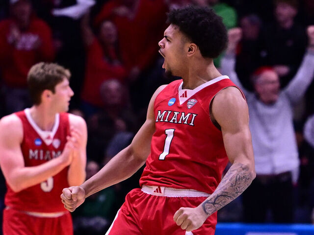 DAYTON, OHIO - MARCH 18: Trey Perry #1 of the Miami (OH) Redhawks reacts to a good play against the SMU Mustangs during the First Four round of the 2026 NCAA Men's Basketball tournament held at UD Arena on March 18, 2026 in Dayton, Ohio.