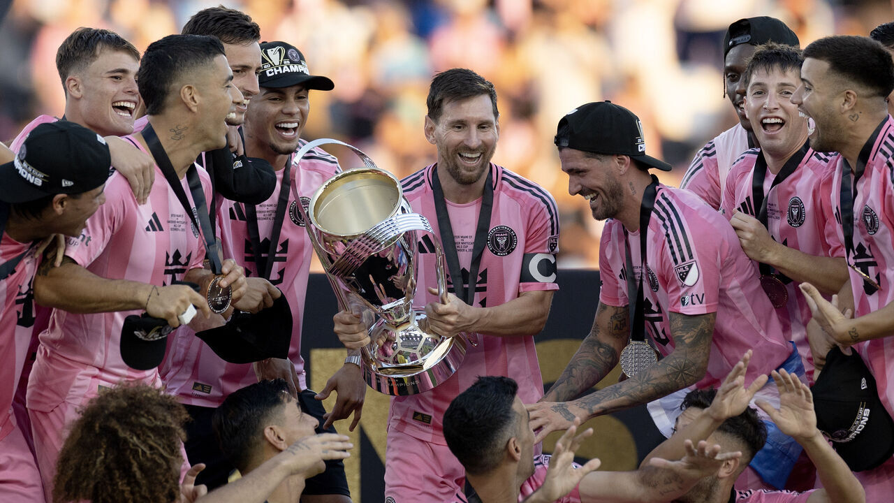 FORT LAUDERDALE, FLORIDA - DECEMBER 06: Lionel Messi #10 of Inter Miami CF celebrate with his teammates for group photos with MLS Cup trophy after defeating Vancouver Whitecaps FC at Chase Stadium on December 6, 2025 in Fort Lauderdale, Florida.