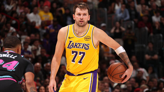 MIAMI, FL - MARCH 19: Luka Doncic #77 of the Los Angeles Lakers handles the ball during the game against the Miami Heat on March 19, 2026 at Kaseya Center in Miami, Florida. Mandatory Copyright Notice: Copyright 2026 NBAE