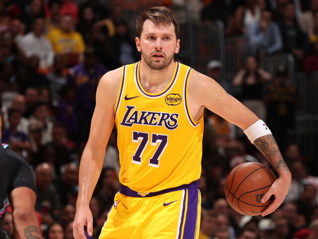 MIAMI, FL - MARCH 19: Luka Doncic #77 of the Los Angeles Lakers handles the ball during the game against the Miami Heat on March 19, 2026 at Kaseya Center in Miami, Florida. Mandatory Copyright Notice: Copyright 2026 NBAE