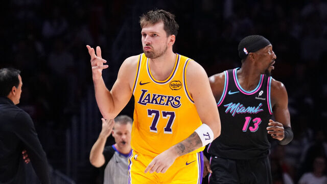 MIAMI, FLORIDA - MARCH 19: Luka Doncic #77 of the Los Angeles Lakers reacts after scoring a three-pointer against the Miami Heat during the third quarter at Kaseya Center on March 19, 2026 in Miami, Florida.