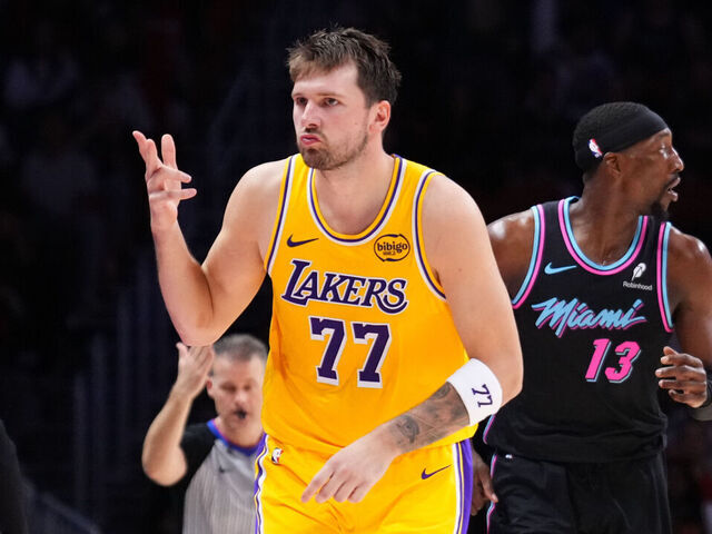 MIAMI, FLORIDA - MARCH 19: Luka Doncic #77 of the Los Angeles Lakers reacts after scoring a three-pointer against the Miami Heat during the third quarter at Kaseya Center on March 19, 2026 in Miami, Florida.