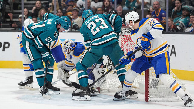 SAN JOSE, CA - MARCH 19: Alex Lyon #34 of the Buffalo Sabres makes a save in the second period against the San Jose Sharks at SAP Center on March 19, 2026 in San Jose, California.