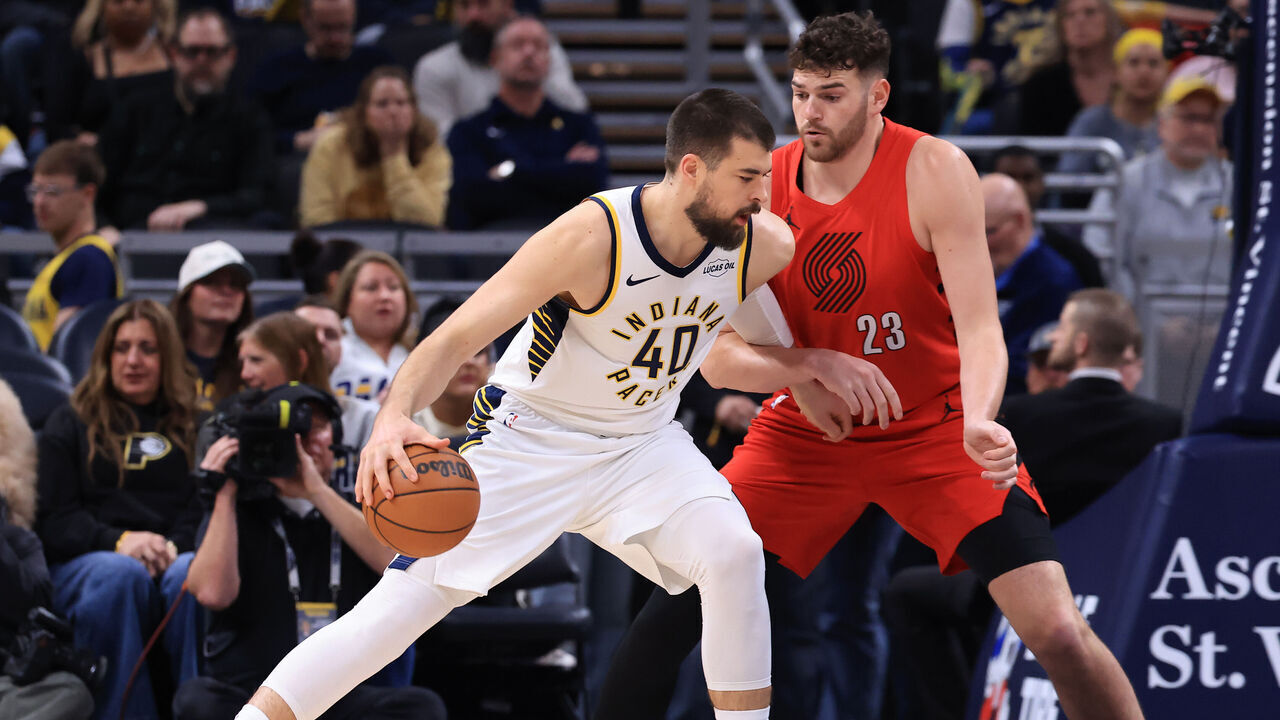 INDIANAPOLIS, INDIANA - MARCH 18: Ivica Zubac #40 of the Indiana Pacers makes a move on Donovan Clingan #23 of the Portland Trail Blazers during the first half at Gainbridge Fieldhouse on March 18, 2026 in Indianapolis, Indiana.