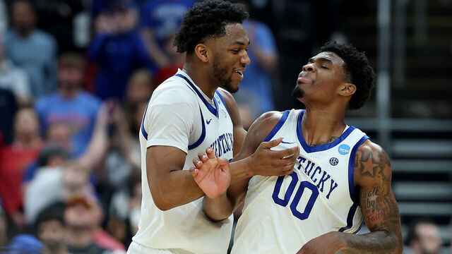 ST LOUIS, MISSOURI - MARCH 20: Mouhamed Dioubate #23 and Otega Oweh #00 of the Kentucky Wildcats celebrate against the Santa Clara Broncos during overtime in the first round of the 2026 NCAA Men's Basketball Tournament at Enterprise Center on March 20, 2026 in St Louis, Missouri.