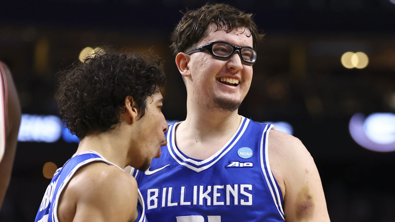 BUFFALO, NEW YORK - MARCH 19: Robbie Avila #21 of the Saint Louis Billikens celebrates with Dion Brown #13 of the Saint Louis Billikens against the Georgia Bulldogs in the first half during the first round of the 2026 NCAA Men's Basketball Tournament held at KeyBank Center on March 19, 2026 in Buffalo, New York.