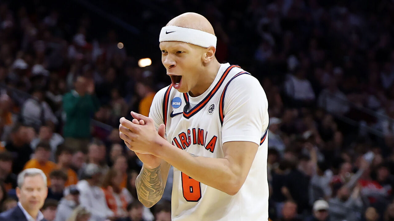 PHILADELPHIA, PENNSYLVANIA - MARCH 20: Jacari White #6 of the Virginia Cavaliers celebrates against the Wright State Raiders during the second half in the first round of the 2026 NCAA Men's Basketball Tournament at Xfinity Mobile Arena on March 20, 2026 in Philadelphia, Pennsylvania.