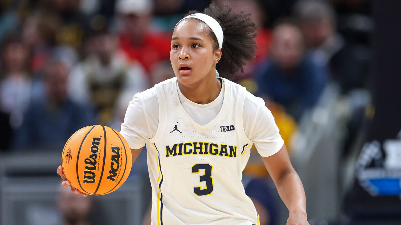 INDIANAPOLIS, INDIANA - MARCH 6: Mila Holloway #3 of the Michigan Wolverines brings the ball up court during the game against the Oregon Ducks in the quarterfinals of the Big Ten Women's Basketball Tournament at Gainbridge Fieldhouse on March 6, 2026 in Indianapolis, Indiana.