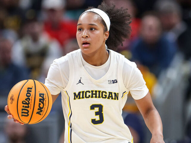 INDIANAPOLIS, INDIANA - MARCH 6: Mila Holloway #3 of the Michigan Wolverines brings the ball up court during the game against the Oregon Ducks in the quarterfinals of the Big Ten Women's Basketball Tournament at Gainbridge Fieldhouse on March 6, 2026 in Indianapolis, Indiana.