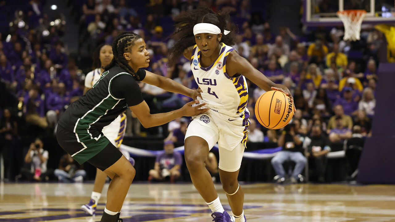 BATON ROUGE, LOUISIANA - MARCH 20: Flau'jae Johnson #4 of the LSU Tigers is defended by Tatum Brown #2 of the Jacksonville Dolphins during the first half in first round of the 2026 NCAA Women's Basketball Tournament at Pete Maravich Assembly Center on March 20, 2026 in Baton Rouge, Louisiana.