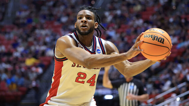 SAN DIEGO, CALIFORNIA - MARCH 20: Zuby Ejiofor #24 of the St. John's Red Storm makes a pass against the Northern Iowa Panthers in the first half of the game of the first round of the 2026 NCAA Men's Basketball Tournament at Viejas Arena at San Diego State University on March 20, 2026 in San Diego, California.